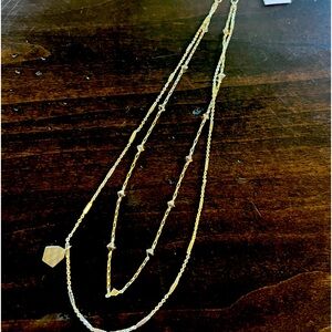 Gold double strand necklace. 14” first strand.  16” second strand.